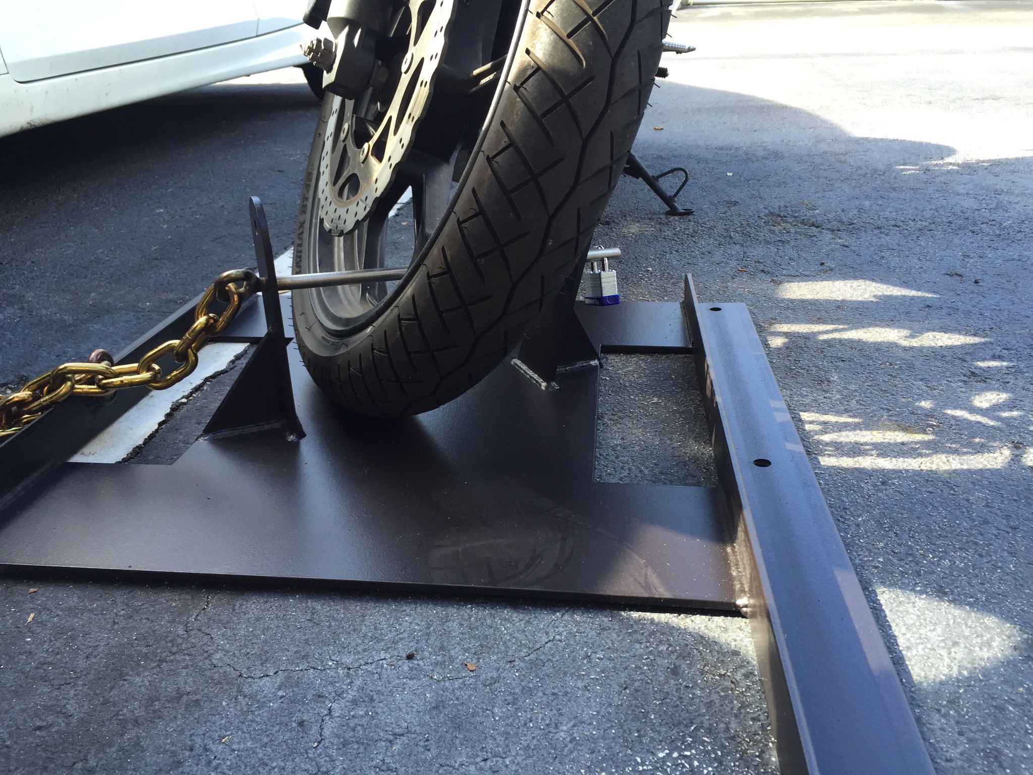 Close-up of MotoKeep rack and motorcycle tire